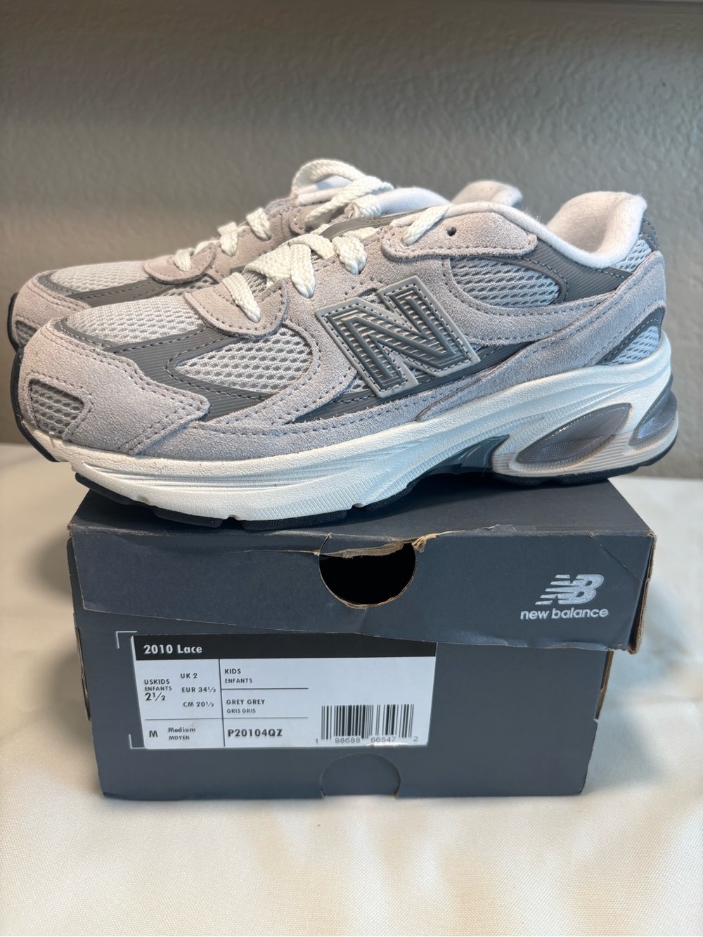 New Balance Kids Lace-Up Sneakers in Grey and White